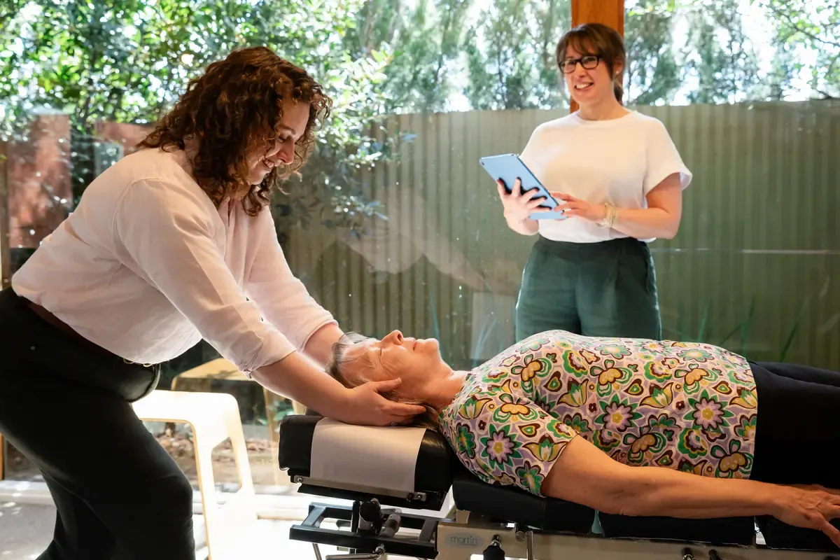 Dr Harriet Walker adjusting a person's neck at The Chiro Crew in Kingswood